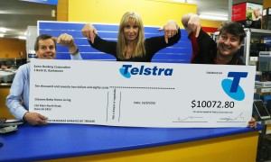 NAR Design presents the Telstra cheque to Kym and Steph from Clewers Betta Home Living Clare